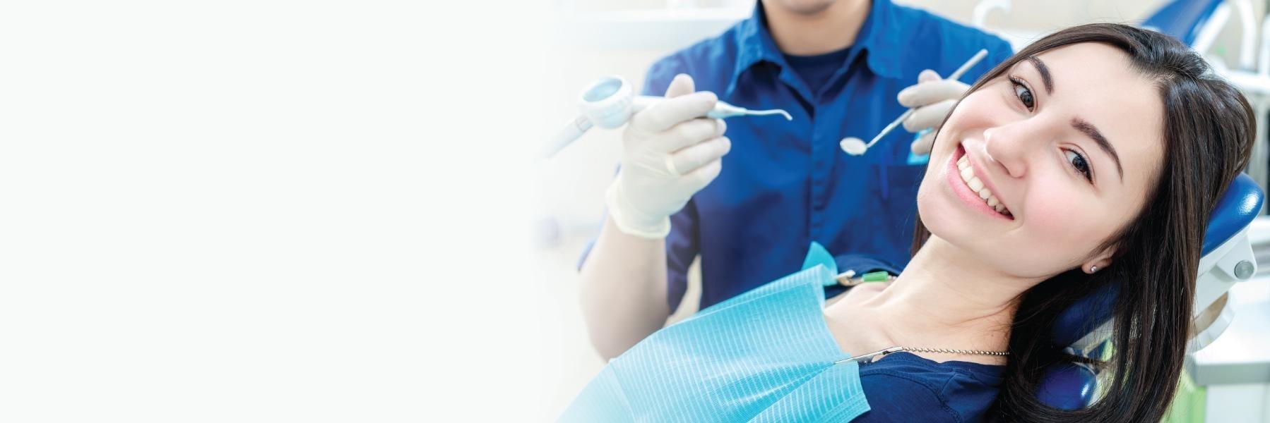 woman sitting in dental chair