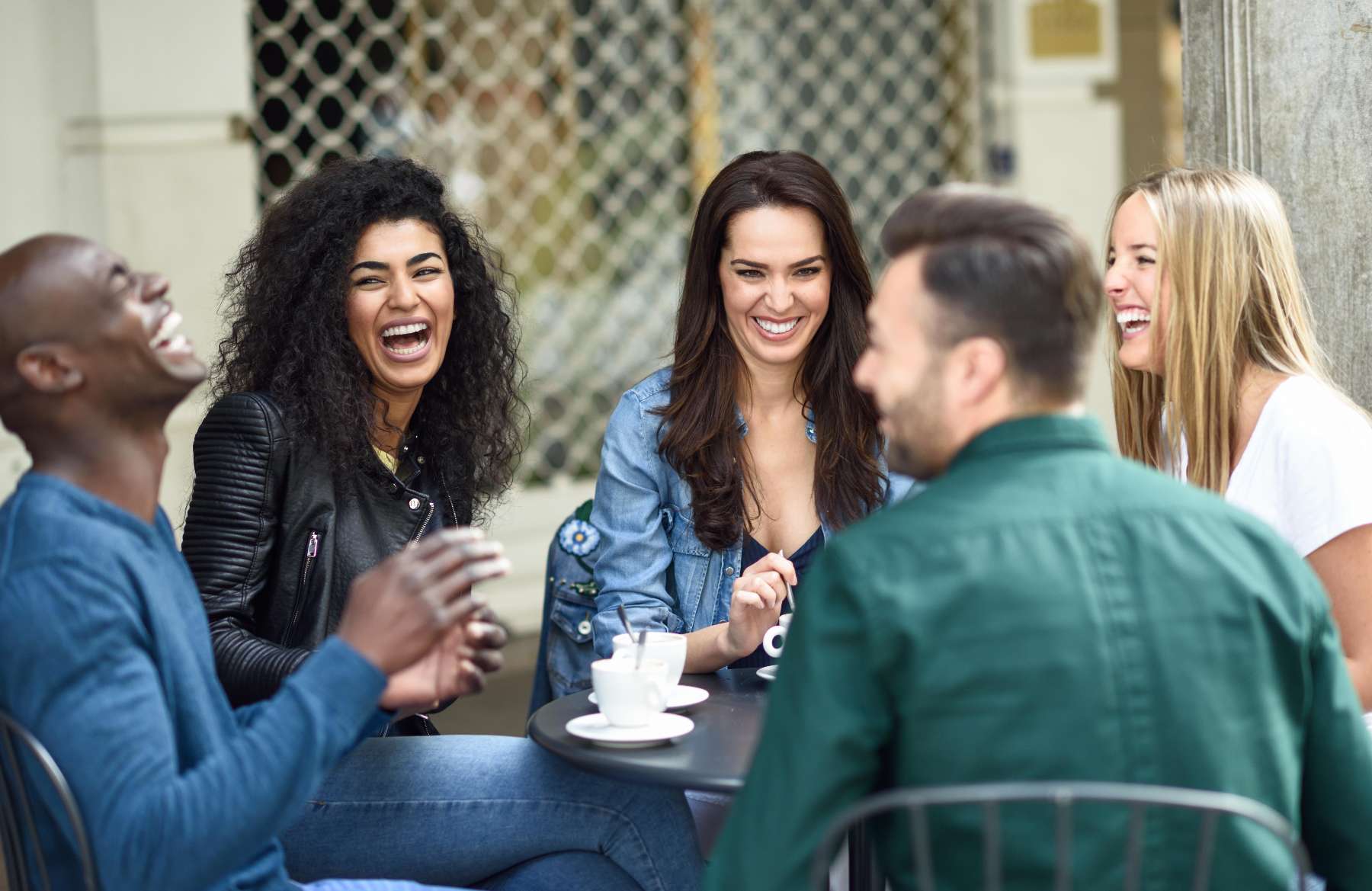 group of friends discussing facial rejuvenation treatment in tampa